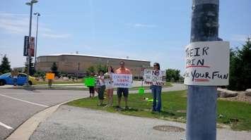 Animal activists protest the Summer Circus Spectacular event at the WFCU Centre, July 2013.