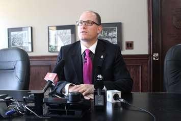 Windsor Mayor Drew Dilkens talks to the media in his office at City Hall, April 15, 2015. (Photo by Mike Vlasveld)