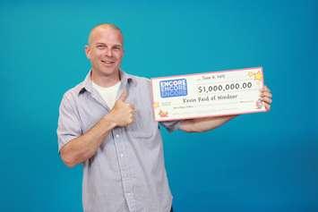 Windsor man Kevin Reid claims his prize from OLG, June 2015. (Photo courtesy OLG)
