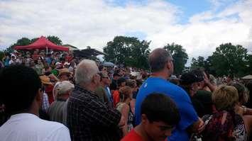 Thousands of fans crowd around to watch the demolition derby at the Comber Fair.