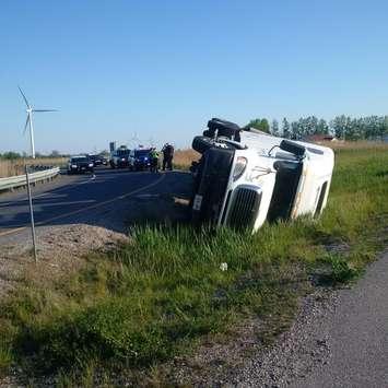 Transport flips on the eastbound ramp from County Rd. 42 to Hwy. 401 in Lakeshore. (Photo courtesy OPP)