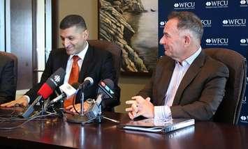 Windsor Mayor Eddie Francis (left) sits with WFCU President Marty Komsa, as they discuss Francis' soon-to-be role with the WFCU. March 26, 2014.