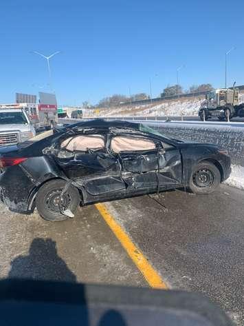 A damaged vehicle is seen in the area of Highway 401 and Highway 3 on November 12, 2019. Photo courtesy Ontario Provincial Police.