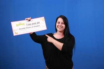 Windsor resident Amanda Macko wins $100,000 from the Ontario Lottery and Gaming Corporation, May 16, 2017. (Photo courtesy of the OLG)