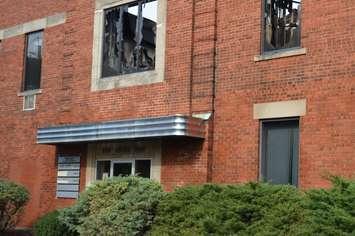 Blown-out windows are seen at the fire-damaged Accucaps building on Argyle Rd. in Windsor on September 20, 2018. Photo by Mark Brown/Blackburn News.