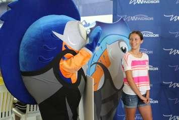 Newly named FINA mascot Splasher is seen with naming competition winner Julianne Pella on July 14, 2015. (Photo courtesy City of Windsor)