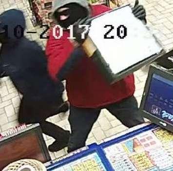 Surveillance photo of suspects in a robbery at a convenience store on Walker Rd. in Windsor, at Ledyard Ave., February 10, 2017. (Photo courtesy the Windsor Police Service)