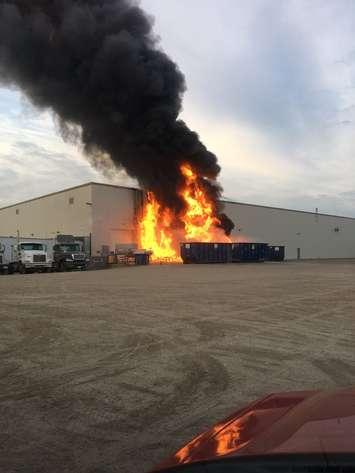 A blaze burns at Top Line Farms in Leamington, July 14, 2018. Photo courtesy of Leamington Fire/Twitter.