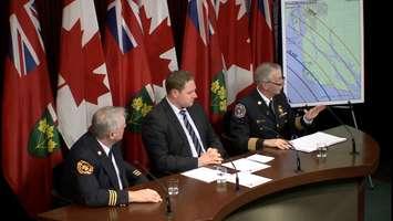 Amherstburg Deputy Fire Chief Lee Tome, Essex MPP Taras Natyshak, and Amherstburg Fire Chief Bruce Montone speak during a press conference at Queen's Park, December 12, 2017. (Photo courtesy of the NDP)