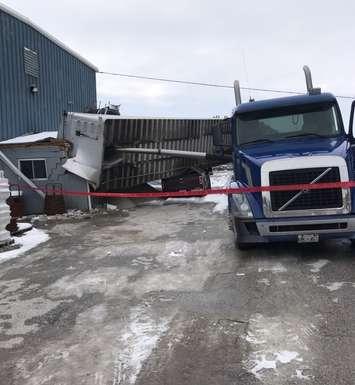A damaged tractor-trailer is seen at Underground Specialties in Tecumseh, November 14, 2019. Photo provided by Ontario Provincial Police/Twitter.