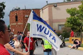The Windsor University Faculty Association flag at Windsor's 2014 Labour Day Parade. (Photo by Adelle Loiselle.)