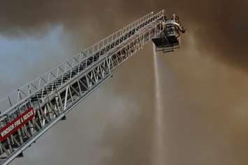 Firefighters battle blaze at Bonduelle factory in Tecumseh on July 18, 2014. (Photo by Adelle Loiselle)