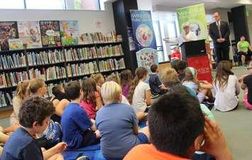 Windsor Public Library CEO Kitty Pope speaks to a group of elementary school students at the branch on Seminole St., June 19, 2017. (Photo by Mike Vlasveld)