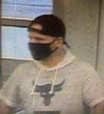 (Photo of a suspect wanted in connection to thefts from Walmart stores in Chatham and Leamington, courtesy of Crime Stoppers Windsor and Essex County)