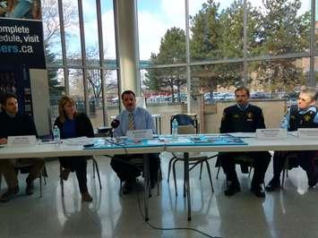From left, Julian Franch of the University of Windsor, Tammy Murray of Our West End, Barry Horrobin, Windsor Police director of planning, Sergeant Chris Zelezney and Constable Rosemary Briscoe participate in a press conference highlighting a partnership between police and Our West End at the UW CAW Student Centre in Windsor, Feb 29 (Photo by Mark Brown)