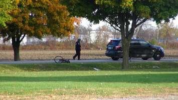 Chatham-Kent Police investigate a crash involving a vehicle and cyclist October 30, 2014. (Photo by Jake Kislinsky)