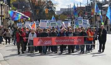 Striking faculty from Fanshawe College march down Richmond St., October 26, 2017. (Photo by Miranda Chant, Blackburn News)