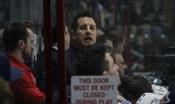 Windsor Spitfires Head Coach Bob Boughner behind the bench, March 6, 2014.