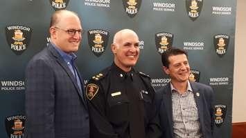 Windsor Mayor Drew Dilkens, left, Windsor Police Chief Al Frederick and Amherstburg Mayor Aldo DiCarlo are all smiles after signing a policing contract at Windsor Police Headquarters, October 12, 2018. Photo by Mark Brown/Blackburn News.