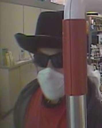 Surveillance photo grab of a suspect in the robbery of a Rexall Drug Store on Huron Church Rd in Windsor on June 23, 2017 (Photo courtesy of Windsor Police Service)
