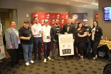 Gordon Orr, CEO of TWEPI, is seen with representatives of craft breweries and distilleries in Windsor-Essex at the launch of the Barrels, Bottles and Brews Trail Flight Log enhancement, at the TownePlace Suites by Marriott in Windsor, June 11, 2019. Photo by Mark Brown/Blackburn News.