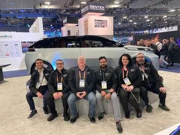 Representatives from APMA, Invest WindsorEssex, and others show off the Project Arrow zero-emission, all-electric vehicle prototype at the Consumer Electronics Show in Las Vegas, January 5, 2023. Photo courtesy Ed Dawson/Twitter.