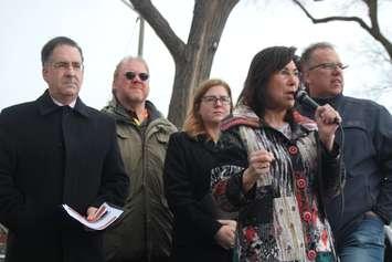 Windsor-Tecumseh MP Cheryl Hardcastle speaks as from left, Windsor West MP Brian Masse, Unifor Local 444's Mark Bartlett, Essex MP Tracey Ramsey and Unifor Local 444 president Dave Cassidy listen during a rally outside the Chrysler Windsor Assembly Plant, March 22, 2019. Photo by Mark Brown/Blackburn News.