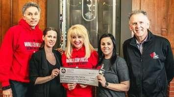 Staff at Walkerville Brewery present a cheque to the Unemployed Help Centre. (Photo courtesy of Walkerville Brewery)