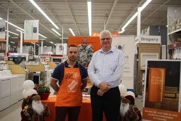Home Depot Store Manager Mark Belanger and Dave Freeman with the Windsor Residence for Young Men at the launch of the annual Orange Door Project, December 4, 2019. (Photo by Maureen Revait) 