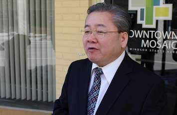 Windsor-West PC Candidate Henry Lau stands outside of the DWBIA office on Pelissier St. in downtown Windsor, March 10, 2014.