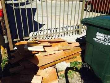 Wood dumped illegally in a Windsor alley.  Photo by Adelle Loiselle)