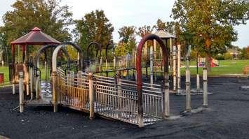 Playground equipment smolders after it was set on fire in Lacasse Park in Tecumseh, October 10, 2017. (Photo by Mark Brown, BlackburnNews.com)