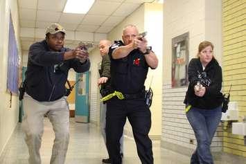 Members of the Windsor Police Service participate in active shooter training at the former Victoria Public School in Tecumseh. 
