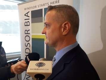 Brian Yeomans, chair of the Downtown Windsor Business Improvement Association, speaks with media about their contributuon to the CAMPP legal fund on March 14, 2019. Photo by Mark Brown/Blackburn News.