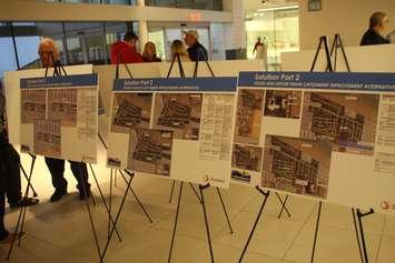 Lakeshore Ward 5 councillor Kirk Walstedt, rear left, speaks with residents during a public information session on the town's stormwater master plan at the Atlas Tube Centre, October 23, 2019. Photo by Mark Brown/Blackburn News.