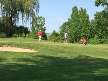 Junior and collegiate golfers play for a shot at getting on to the Jamieson Junior Golf Tour at a qualifying tournament on May 25, 2014. (Photo by Ricardo Veneza)