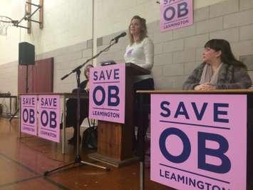 Ontario Health Coalition Executive Director Natalie Mehra (right) watches on as local mother Sandra Dick speaks about the need of the obstetrics unit in Leamington at a meeting at Leamington District Secondary School on January 20, 2015. (Photo by Ricardo Veneza)