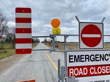 Downed hydro poles have closed a section of Concession Road 3 North in Amherstburg on Saturday, December 3, 2022. (Millar Hill)