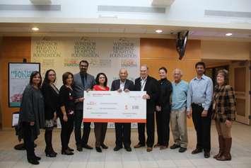 Members of the India Canada Association present a cheque to the Windsor Regional Hospital Foundation, November 21, 2019. (Photo by Maureen Revait) 