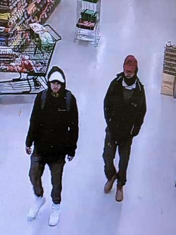 A pair of men accused of robbing a grocery store in Sandwich. March 30, 2023. Photo via Windsor police.