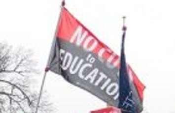 Protest flag at a rally by OSSTF members. (Blackburn News file photo)