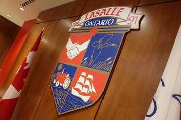 The Town of LaSalle's coat of arms hanging at LaSalle Town Hall. (Photo by Mike Vlasveld)