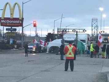 Protesters on Huron Church Road in Windsor. Photo by Adelle Loiselle 